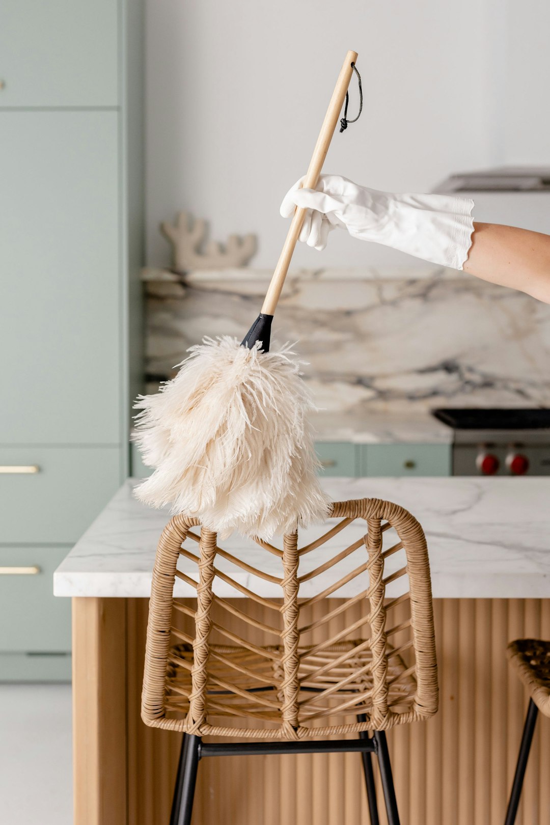 about-01 a-person-in-white-gloves-is-cleaning-a-chair-wnudjlnuohu