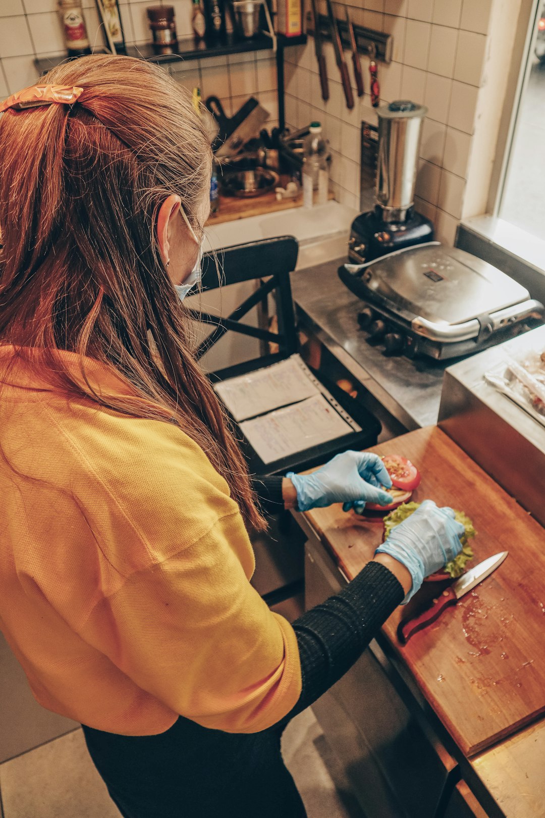home-services-02 woman-in-yellow-long-sleeve-shirt-holding-blue-and-white-plastic-bottle-srqczhfbsko